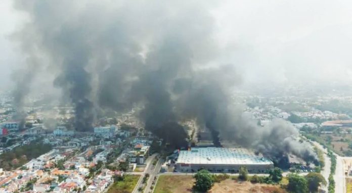Mexico An aerial photograph shows plumes of smoke over Puerto Vallarta. The prison break happened as a wave of violence rocked Puerto Vallarta and towns and cities in 19 other states. EPA