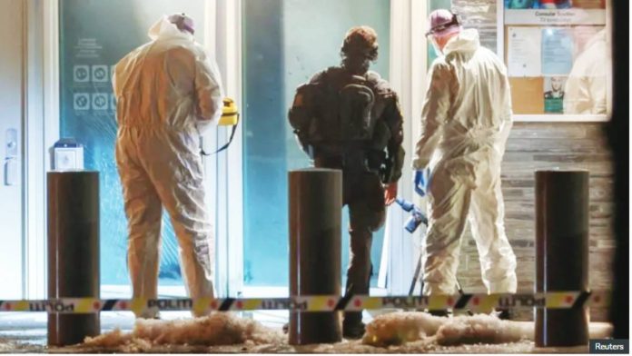 Norway Police and forensic experts inspect the site of the explosion at the US embassy in Oslo, Norway. REUTERS