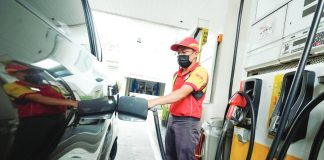 A fuel station attendant fills up a vehicle at a gas station along Timog Avenue in Quezon City. Facing the risk of a fuel supply disruption amid escalating tensions in the Middle East, President Ferdinand “Bongbong” Marcos Jr. has ordered diplomatic engagement with Iran to secure the safe passage of Philippine-bound oil shipments through the Strait of Hormuz. PNA