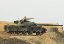 Pakistan defense minister says country in ‘open war’ with neighbour Afghanistan A tank is seen near a wall along the border in Chaman, Pakistan. AFP via Getty Images