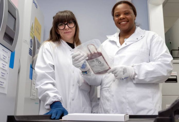 UK Mina Stoddart-Stones (right), from Bridgwater in Somerset, United Kingdom, with Joanne Matthews), manager of the NHS Blood and Transplant in Speke, Liverpool. PETER BYRNE/PA