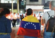 UN receives reports alleging torture of detainees in Venezuela continues Relatives of political prisoners hold candles and posters during a vigil in Zamora, Venezuela. MIGUEL GUTIÉRREZ/EPA/SHUTTERSTOCK