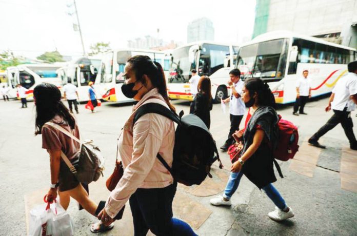 bus trips Passengers head to a provincial bus terminal in Cubao, Quezon City ahead of the start of Holy Week in this file photo. Thousands of Filipinos are expected to flock to the provinces to mark the most sacred week in the liturgical year during the extended holiday. MARIA TAN, ABS-CBN NEWS PHOTO