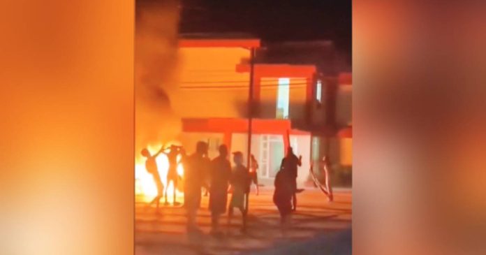 cuba Cuban protesters burn objects in front of the Communist Party office. Discontent among Cubans has been mounting over rolling blackouts and shortages of food, fuel and medicine, among others. BBC