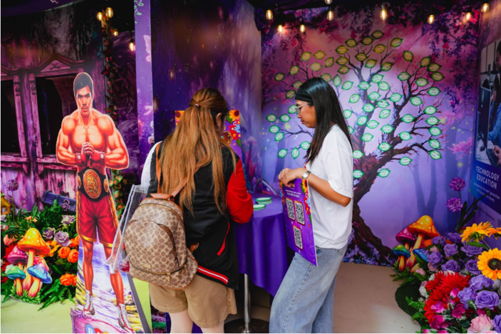 Panagbenga festivalgoers submit their wishes at the BingoPlus booth for the DigiPlus Foundation WishPlus initiative.