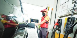A fuel station attendant fills up a vehicle at a gas station along Timog Avenue in Quezon City. Under Executive Order 110, the Marcos administration activated a coordinated national framework aimed at securing fuel supply, stabilizing prices, and ensuring uninterrupted delivery of essential services amid rising risks in the global energy market. PNA