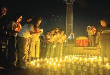 BEYOND ‘EARTH HOUR’: ‘Ligum Dulom’ pushes sustained action amid energy woes LIGHTS OUT, HOPE ON. Participants light candles at the Iloilo Provincial Capitol grounds during Earth Hour 2026: “Ligum Dulom Year 4”, symbolizing collective action and renewed commitment to energy conservation and environmental protection. PHOTOS FROM PGENRO-PROVINCE OF ILOILO