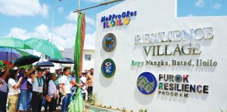 Iloilo’s Gov. Arthur Defensor Jr. leads the unveiling of the “Resilience Village” marker in Brgy. Nangka, Batad, formally turning over permanent housing units to families relocated from a landslide-prone area under the province’s Purok Resilience Program. PHOTO FROM BALITA HALIN SA KAPITOLYO
