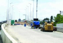 Repair works continue at the Buhang Flyover in Barangay Buhang, Jaro, Iloilo City. Damaged slabs are being replaced. The P315-million flyover, which developed cracks on several sections, is targeted to reopen to motorists in May 2026 once rehabilitation works are completed. AJ PALCULLO/PN