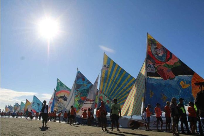 Along the shores of Arevalo, Iloilo City, paraws get ready for the main race of the Paraw Regatta Festival, where 41 traditional double-outrigger sailboats competed in a 26-kilometer course on March 1, 2026. Divided into three categories based on size, each wind-powered vessel reflected the enduring maritime heritage and craftsmanship of Ilonggo fishing communities. AJ PALCULLO/PN