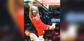 Miami Heat center Bam Adebayo soars for a dunk. GETTY IMAGES