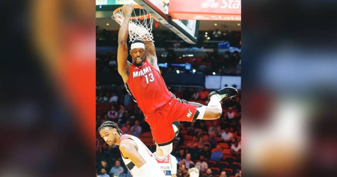 nba Miami Heat center Bam Adebayo soars for a dunk. GETTY IMAGES