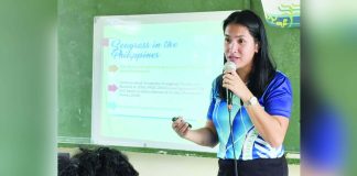 Environmental Specialist Grace Aquino explains how seagrasses function as carbon sinks that help mitigate climate change, nurseries that support diverse marine life, and natural barriers that shield coastlines from erosion and extreme weather events, during a special environmental learning activity in Ajuy, Iloilo. DENR-6 PHOTO