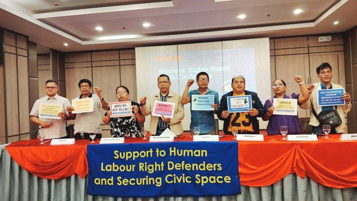 neljoy labor groups Labor leaders and advocates raise placards and fists during a Workers’ Rights Watch press conference in Iloilo City, calling for wage increases, protection of union rights, and stronger safeguards for labor amid rising economic pressures. NELJOY GALIGAO/PN