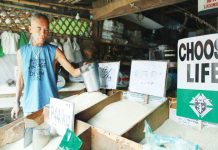 Rice retailers scramble as supply costs spike Veteran rice retailer Antonio Parparan attends to his stall in Pavia, Iloilo, reporting a P50 increase per sack and steady demand despite rising prices, as customers continue to rely on rice as a staple. AJ PALCULLO/PN