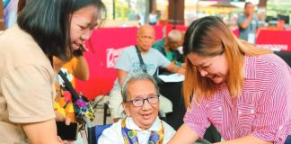 A senior citizen in Western Visayas receives her cash gifts under the Expanded Centenarians Act as the National Commission of Senior Citizens Region 6 disburses over P315 million to nearly 30,000 elderly beneficiaries, honoring milestone ages and lifelong contributions. NCSC-6 PHOTO