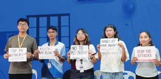 Youth leaders from various organizations hold placards condemning red-tagging and calling for the abolition of the National Task Force to End Local Communist Armed Conflict during a press activity following the controversy over a “peace awareness” forum at Central Philippine University in Iloilo City. The groups warned that labelling student organizations as communist fronts endangers the safety of campus activists and undermines academic freedom. PHOTO FROM FORUM-DIMENSIONS, WVSU