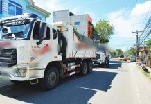 Dump trucks suspected of transporting illegally quarried materials are intercepted and impounded by police during coordinated enforcement operations in Iloilo province on Feb. 28, 2026. Authorities seized nine trucks. ILOILO POLICE PROVINCIAL OFFICE PHOTO