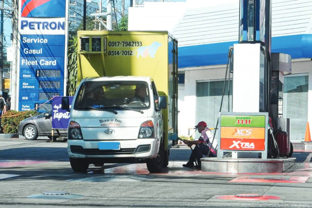 A gasoline station staff attends to a customer in Quezon City. Amid rising oil prices caused by the Middle East conflict, President Ferdinand R. Marcos Jr. assured his administration is continuing efforts to secure sufficient fuel and food supplies. PNA