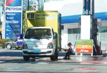 A gasoline station staff attends to a customer in Quezon City. Amid rising oil prices caused by the Middle East conflict, President Ferdinand R. Marcos Jr. assured his administration is continuing efforts to secure sufficient fuel and food supplies. PNA