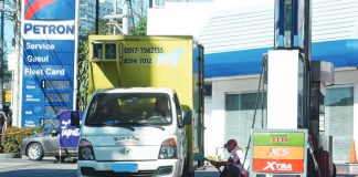 A gasoline station staff attends to a customer in Quezon City. Amid rising oil prices caused by the Middle East conflict, President Ferdinand R. Marcos Jr. assured his administration is continuing efforts to secure sufficient fuel and food supplies. PNA