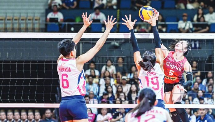 sports Cignal Cignal Super Spikers’ Vanessa Gandler attacks against the defense of Negrense Bernadette Pons of Creamline Cool Smashers. PVL PHOTO