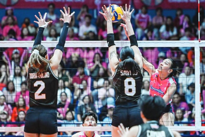 sports Cream Creamline Cool Smashers’ Alyssa Valdez attacks against Cignal Super Spikers’ Erika Santos. PVL PHOTO