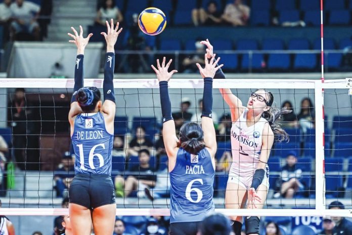 sports Falcons Adamson University Lady Falcons’ Shaina Nitura scores against the defense of Dona Mae de Leon of Ateneo de Manila University Blue Eagles. UAAP PHOTO