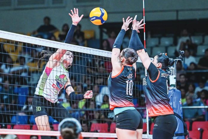 sports NX Brooke Van Sickle of Nxled Chameleons attempts to score against Jean Asis of Galeries Tower Highrisers. PVL PHOTO