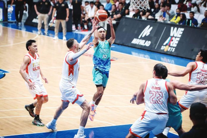 sports PBA copy Evan Nelle drained three four-pointers for the Phoenix Super LPG Fuel Masters in the fourth quarter against Titan Ultra Giant Risers. PBA PHOTO