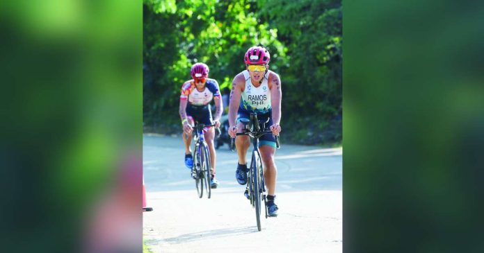 Joshua Ramos celebrates after capturing the Filipino Elite title in the 5150 Triathlon Guimaras. CONTRIBUTED PHOTO