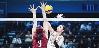 University of Santo Tomas Golden Tigresses’ Lianne Penuliar scores against the defense of Niña Ytang of University of the Philippines Fighting Maroons. UAAP PHOTO