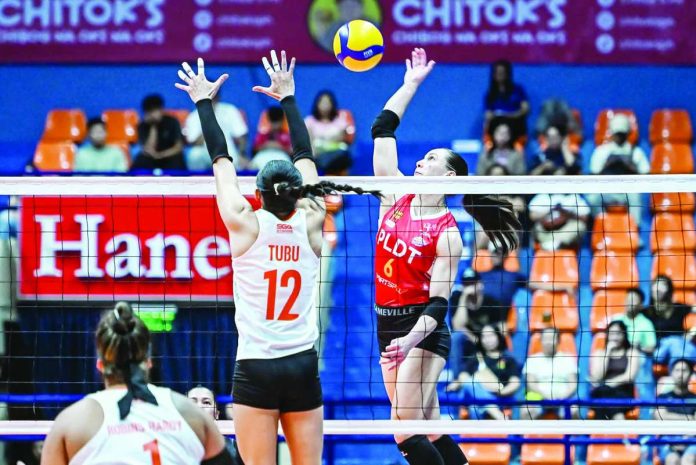 sports_Davison_copy_compressed_resized Savannah Davison of the PLDT High Speed Hitters attacks against the defense of Farm Fresh Foxies’ Trisha Tubu during their five-set showdown in the 2026 PVL All-Filipino Conference at the Filoil Centre in San Juan City, Metro Manila. PVL PHOTO