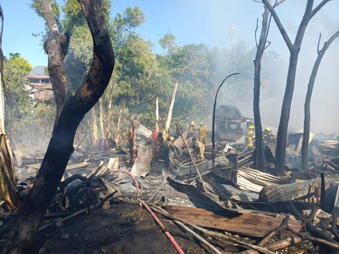 sunog gustilo la paz Firefighters work to douse the remains of a fire that tore through Zone 2, Barangay Gustilo, La Paz, Iloilo City on Thursday afternoon, March 19. According to authorities, the blaze gutted approximately 15 houses, most of which were made of light materials. AJ PALCULLO/PN