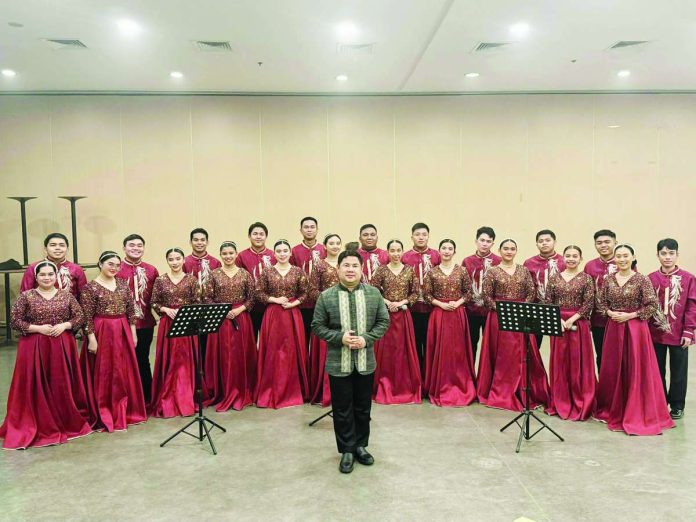 1_compressed_resized Kinaadman Chorale with their director, Roque Magsipoc