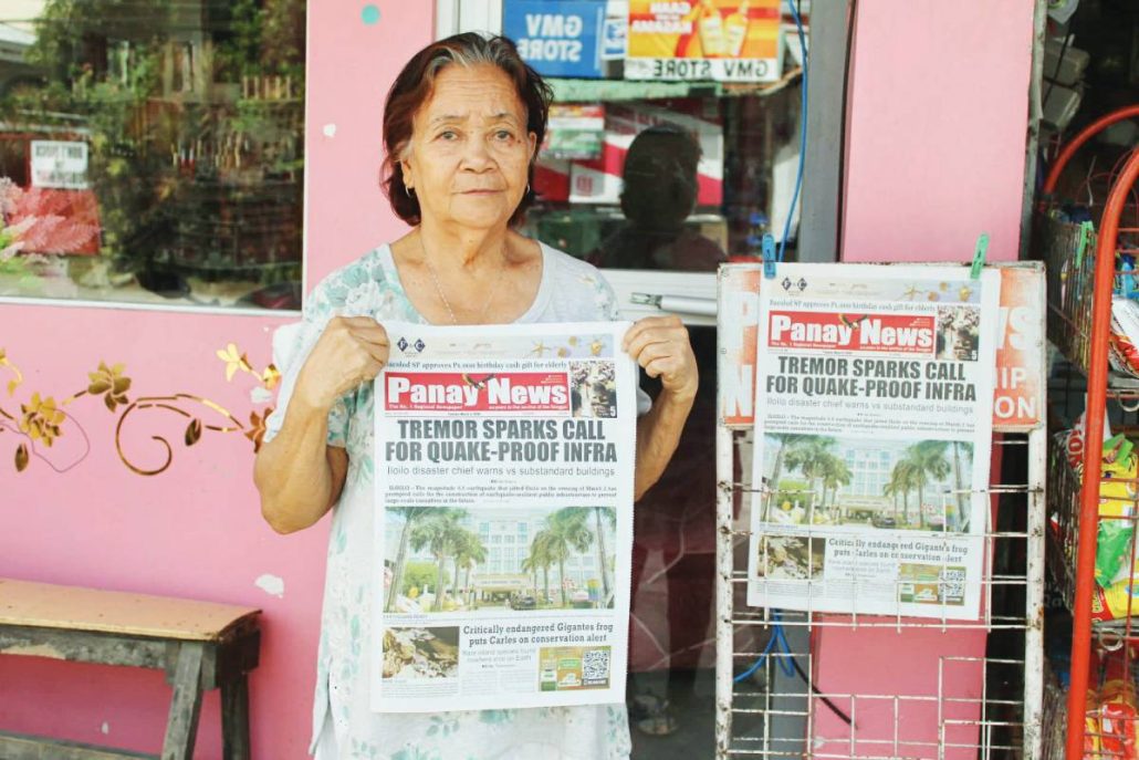 Tarcela Jamolin, 76 years old, from Balabag, Pandac, Pavia, has been selling newspapers for over 10 years.