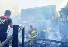 32 Bacolod houses gutted by fire; over 70 families displaced Firefighters conduct a mopping-up operation following a massive fire that tore through a residential area in Barangay 14, Bacolod City on Tuesday afternoon, April 21, 2026. Authorities reported that the blaze destroyed 22 houses and left 10 others partially damaged. BARANGAY 14 PHOTO