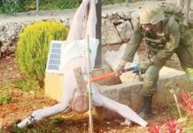 Israeli soldier vandalizes Jesus statue in Lebanon An Israeli soldier uses an implement to hit the face of an upturned statue of Jesus Christ in south Lebanon. The Israeli military said it viewed the soldier's actions with “great severity”. REUTERS
