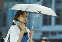 Japan reveals new name for 40C and hotter days after blistering summer A woman walking on the street shields herself with a parasol in Tokyo, Japan. David Mareuil/Anadolu via Getty Images