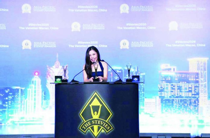 MPIW_banner_pic_compressed_resized GOLDEN MOMENT. Beatrice Janine Melliza, Corporate Affairs head of Metro Pacific Iloilo Water, delivers her acceptance speech at the Asia-Pacific Stevie Awards at the Venetian Hotel, Macao, China as she receives the Gold trophy on behalf of the company.