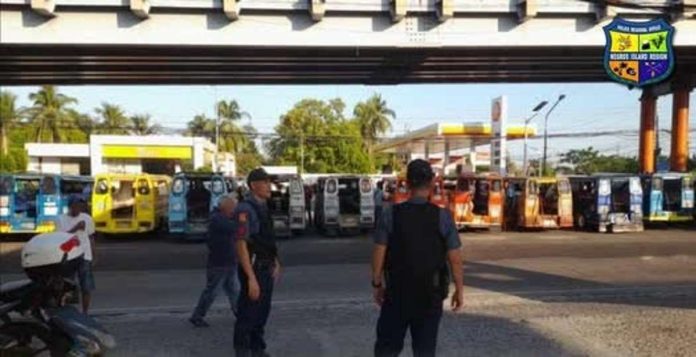 Police personnel from the Police Regional Office–Negros Island Region (PRO-NIR) remained on standby at a key area in Bacolod City during the three-day nationwide transport strike from April 15 to 17, ensuring public safety, maintaining order, and providing immediate response as part of heightened security operations. PRO-NIR PHOTO