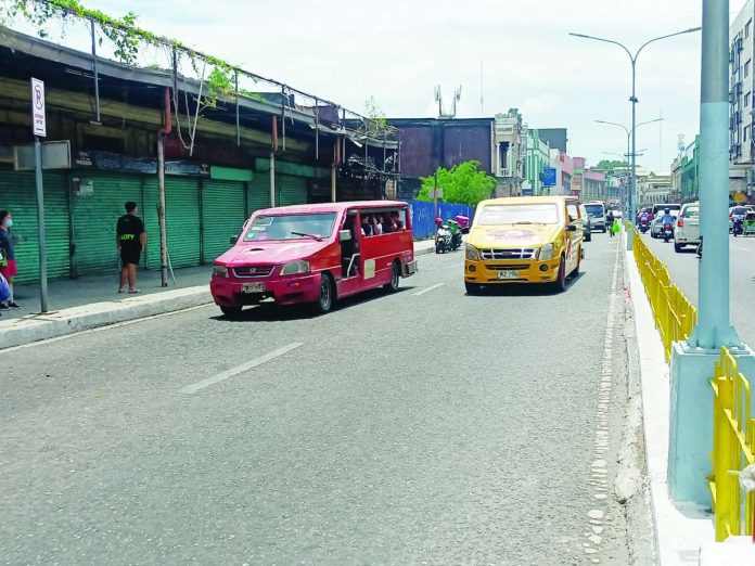 PUVs_pic_compressed_resized The Land Transportation Franchising and Regulatory Board (LTFRB) Region 6 will distribute fuel cash assistance to an estimated 8,000 to 10,000 public utility vehicle drivers and operators today, April 24, and April 25 at the LTFRB regional office in Barangay Quintin Salas, Jaro, Iloilo City. AJ PALCULLO/PN