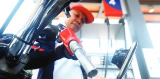 An attendant refills the fuel tank of a motorcycle at a gas station in Paco, Manila. President Ferdinand Marcos Jr. has announced that fuel prices will drop, with diesel set to record the largest reduction. PNA
