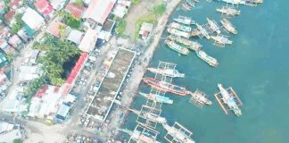 The aerial view of Libas Fishing Port in Roxas City where several fishing vessels have temporarily ceased operations due to the burden of rising fuel costs. MAYOR RONNIE DADIVAS FB PHOTO