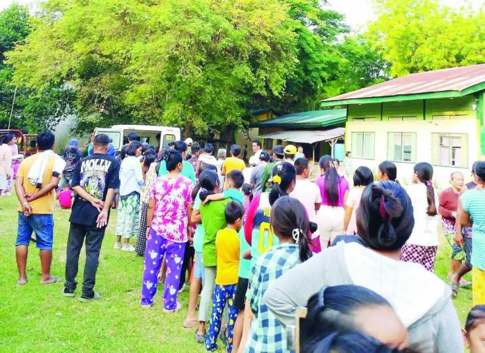 Toboso armed encounter_compressed Displaced residents from Barangay Salamanca in Toboso, Negros Occidental took shelter in evacuation centers on April 19 following an armed encounter between government troops and suspected insurgents, which forced hundreds of families to flee their homes for safety. PHOTO COURTESY OF JHO-NHA MALAGA ALSADO