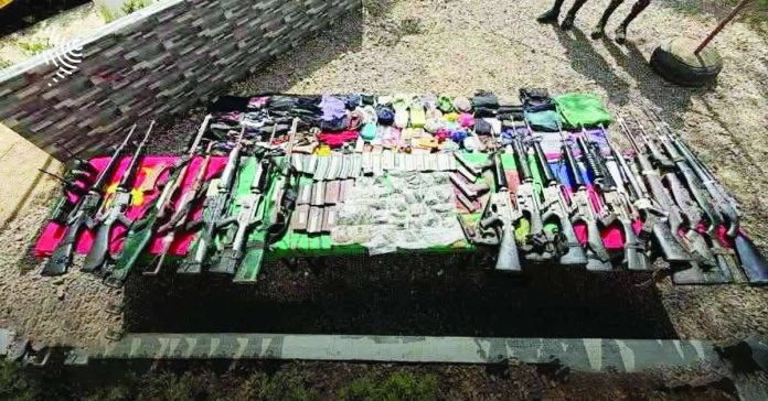 Firearms and war materiel recovered from the encounter site in Barangay Salamanca, Toboso, Negros Occidental following the clash on April 19, 2026 that left 19 individuals dead. KALINAW NEWS PHOTO