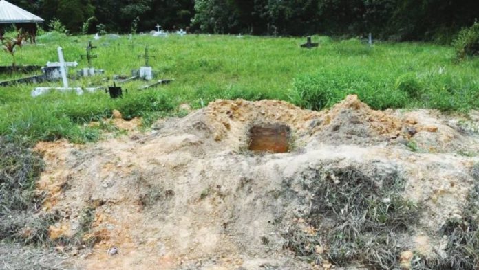 Trinidad copy In an open grave in Cumuto, Trinidad and Tobago, unclaimed bodies may have been dumped. AFP via Getty Images