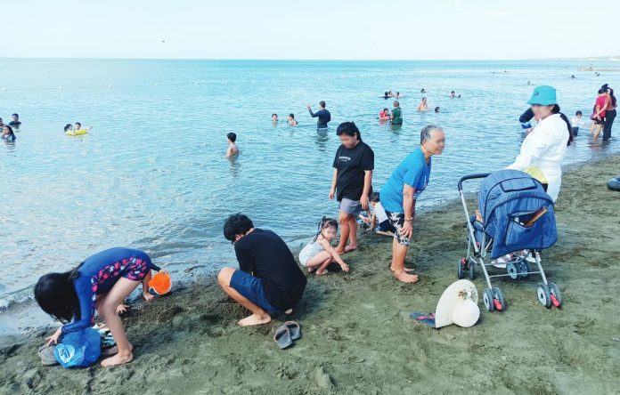 Families beat the heat at a beach in Oton, Iloilo on Easter Sunday, April 5. The Philippine Atmospheric, Geophysical, and Astronomical Services Administration (PAGASA) Dumangas Station recorded a dangerous 43°C heat index on the same day. Authorities have cautioned that prolonged exposure to such intense heat significantly increases the risk of heat-related illnesses such as heat cramps, heat exhaustion, and even heat stroke. AJ PALCULLO/PN