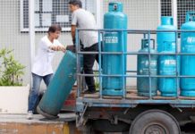 Excise tax on LPG, kerosene suspended to aid poor, middle class Workers unload liquefied petroleum gas tanks for delivery at a hotel in Manila on April 8, 2026. President Ferdinand R. Marcos Jr. on Monday, April 13, suspended the excise tax of LPG and kerosene to help Filipinos cope with rising fuel prices. PNA PHOTO BY YANCY LIM