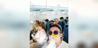 Passengers onboard Philippine Airlines Express flight PR 2544 wear oxygen masks as they endure a mid-air emergency caused by a cabin pressurization problem, moments before the aircraft made an emergency landing in Iloilo on April 19, 2026. Photo courtesy of passenger Jong Narciso